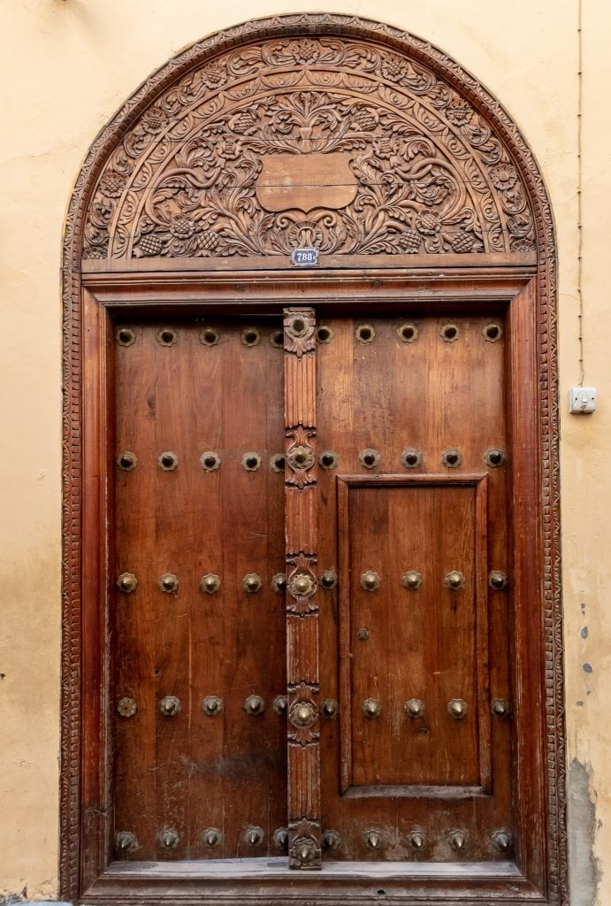 Stone Town Historic wooden door - 10 Days Tanzania Safari and Zanzibar Holiday